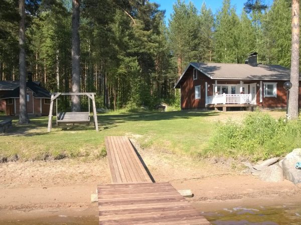 A wooden cottage by the lake